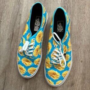 Never worn Mens Vans Sz 12. Blue w/ french fry pattern. Lace ups.
